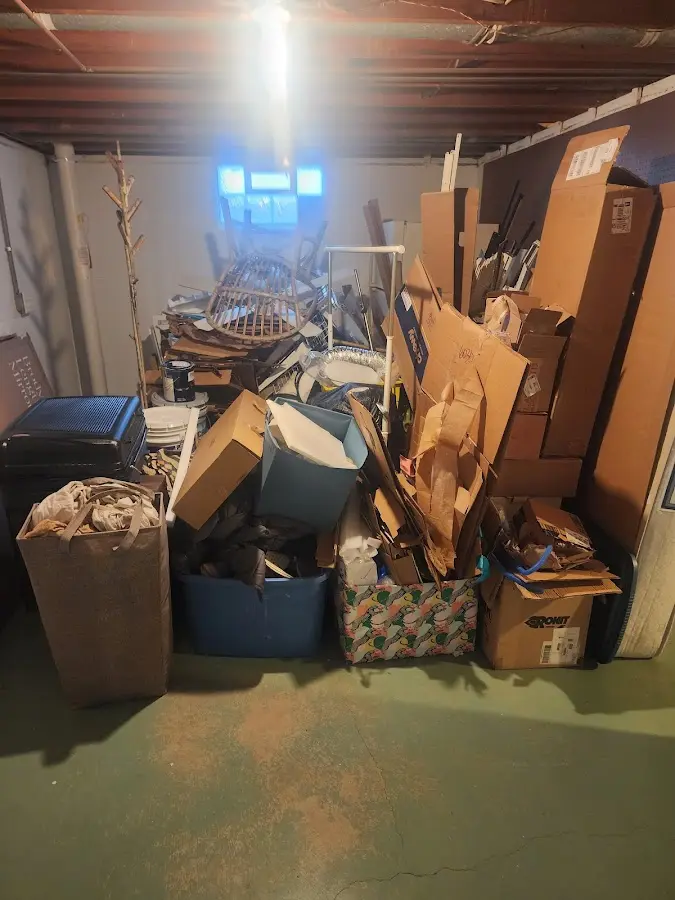 Roll-off dumpster container at job site for Yard Waste Dumpster Rental in Rexland Acres