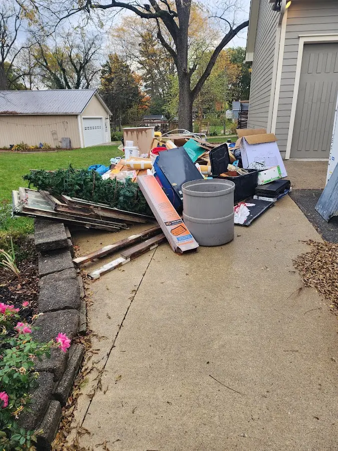 Dumpster being loaded with debris for Residential Dumpster Rental in Rexland Acres